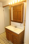 OAk bath vanity and built in cupboards